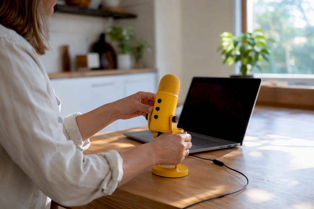 Hands setting up audio recorder for user testing